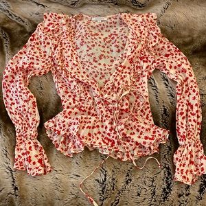 Olivaceous white wrap blouse with red floral-like print - S